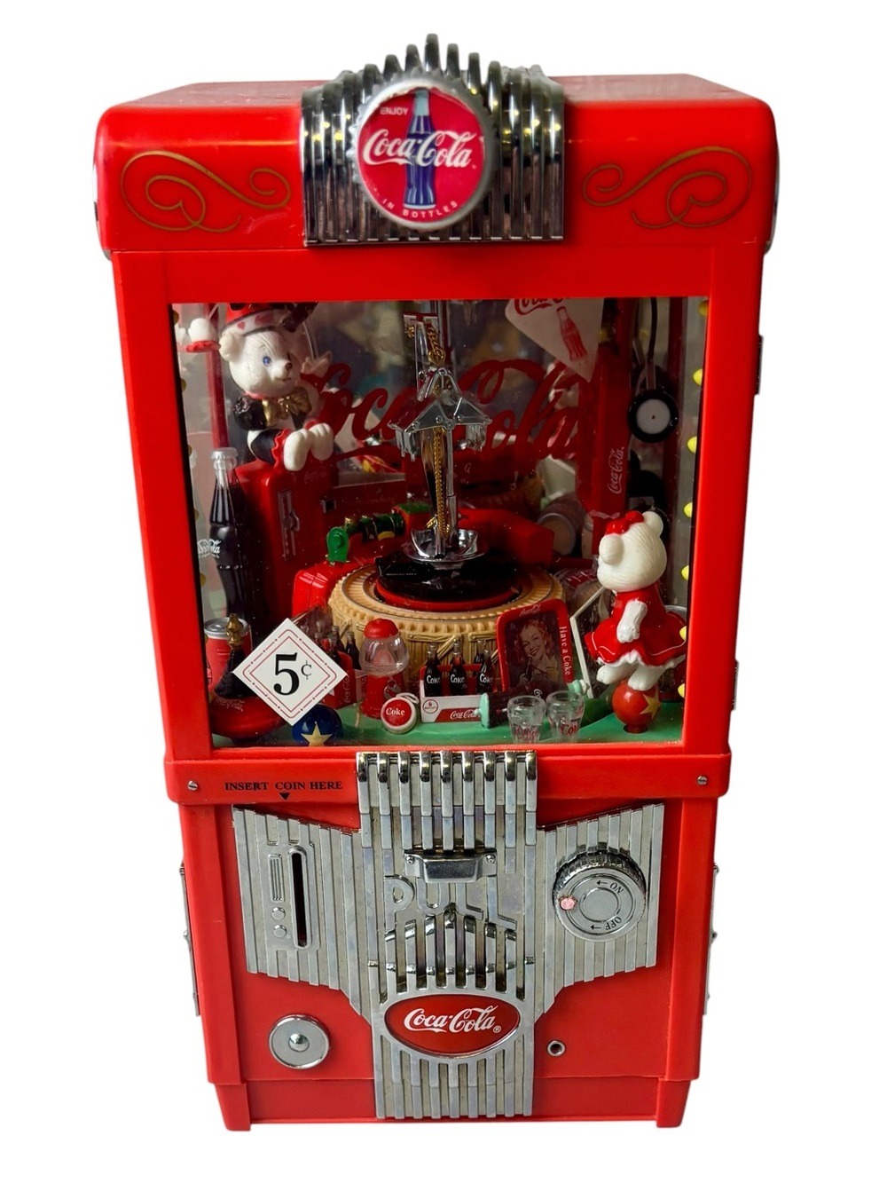 1997 Enesco Coca-Cola “Grabbin’ Ice Cold Refreshment” Claw Machine Music Box